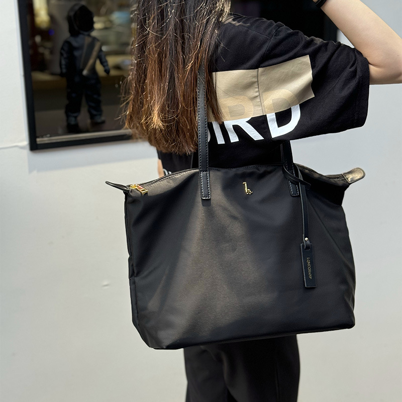 Women's Handle Bags Bag Women's Large Capacity Tote Bag Commuter Fashion Shoulder Bag Joker Advanced Texture Solid Color Soft Leather Bag.