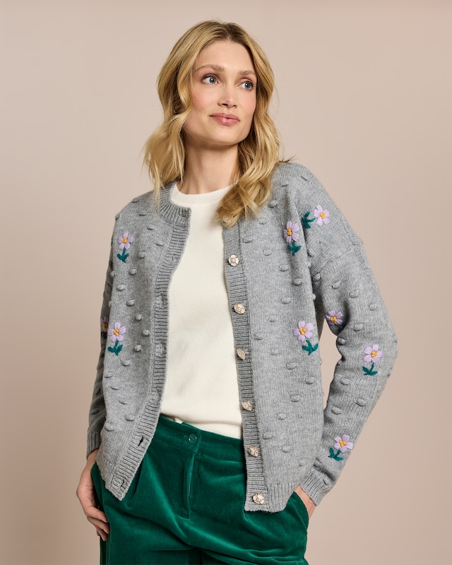 Cardigan mit Blumen und Pompoms